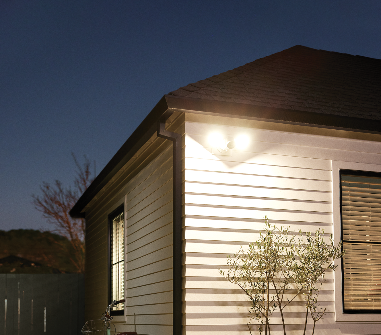 Google Nest Cam Floodlight on a house during nighttime Google Nest Cam Floodlight on a house during nighttime