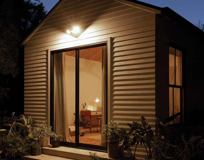 Google Nest Cam Floodlight on a house during nighttime Google Nest Cam Floodlight on a house during nighttime