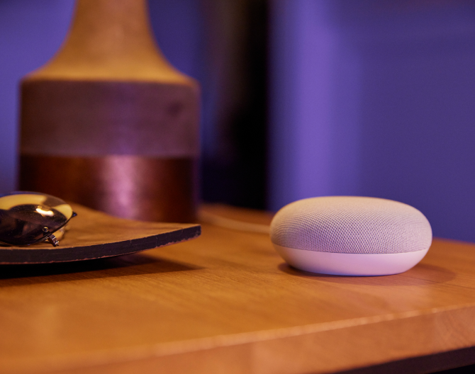 Google Nest Mini 2 Gen on a bedside table